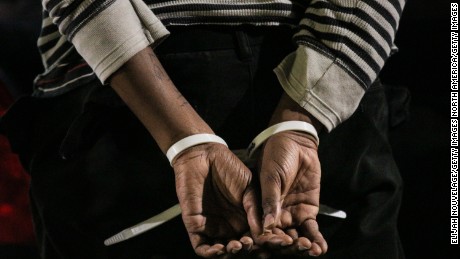 OAKLAND, CA - DECEMBER 13: The hands of a black protester are seen following his arrest at a &#39;Millions March&#39; demonstration protesting the killing of unarmed black men by police on December 13, 2014 in Oakland, California. The march was one of many held nationwide. (Photo by Elijah Nouvelage/Getty Images)