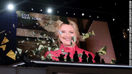 PHILADELPHIA, PA - JULY 26:  A screen displays Democratic presidential candidate Hillary Clinton delivering remarks during the evening session on the second day of the Democratic National Convention at the Wells Fargo Center, July 26, 2016 in Philadelphia, Pennsylvania. Democratic presidential candidate Hillary Clinton received the number of votes needed to secure the party&#39;s nomination. An estimated 50,000 people are expected in Philadelphia, including hundreds of protesters and members of the media. The four-day Democratic National Convention kicked off July 25.  (Photo by Drew Angerer/Getty Images)