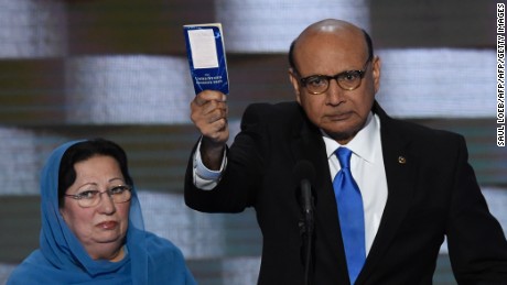 Khizr Khan holds his personal copy of the US Constitution while addressing delegates on the fourth and final day of the Democratic National Convention at Wells Fargo Center on July 28, 2016 in Philadelphia, Pennsylvania.  
Khizr Khans son, Humayun S. M. Khan was a University of Virginia graduate and enlisted in the US Army. Khan was one of 14 American Muslims who died serving the United States in the ten years after the September 11, 2001 terrorist attacks. / AFP / SAUL LOEB        (Photo credit should read SAUL LOEB/AFP/Getty Images)