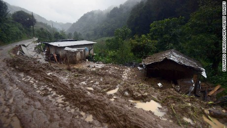 View of the community of Coscomatepec, Veracruz in eastern Mexico on August 6, 2016. 
Six people died in the Mexican state of Veracruz after their homes were buried by landslides following heavy rains from Earl, which reached Mexican territory on Thursday as a tropical storm and Saturday was only a remnant low pressure. / AFP PHOTO / EDUARDO MURILLOEDUARDO MURILLO/AFP/Getty Image