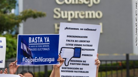 Nicaraguans protest in front of the Supreme Electoral Council (CSE) against the reelection of president Daniel Ortega and of his wife Rosario Murillo as vice presidential candidate for the upcoming November election, in Managua, on August 3, 2016.


 / AFP / ALFREDO ZUNIGA        (Photo credit should read ALFREDO ZUNIGA/AFP/Getty Images)