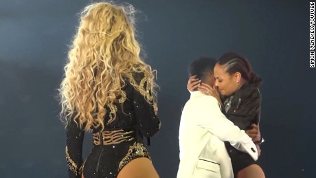 Beyonce&#39;s Creative Director John Silver proposes to her dance captain Ashley Everett at a September 10 concert in St. Louis.