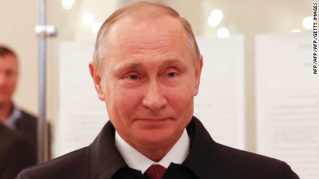Russian President Vladimir Putin visits a polling station during parliamentary elections in Moscow on September 18, 2016. / AFP / POOL / GRIGORY DUKOR        (Photo credit should read GRIGORY DUKOR/AFP/Getty Images)