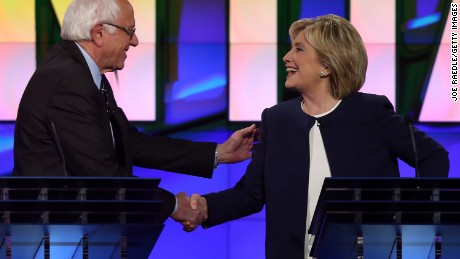 Democratic presidential candidates U.S. Sen. Bernie Sanders and Hillary Clinton shake hands at the end of a presidential debate sponsored by CNN and Facebook at Wynn Las Vegas on October 13, 2015 in Las Vegas, Nevada. 