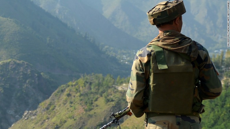 An Indian army soldier looks towards the site of a gunbattle between Indian army soldiers and rebels inside an army brigade headquarters near the border with Pakistan, known as the Line of Control (LoC), in Uri on September 18, 2016.
Militants armed with guns and grenades killed 17 soldiers in a raid September 18 on an army base in Indian-administered Kashmir, the worst such attack for more than a decade in the disputed Himalayan region. / AFP / TAUSEEF MUSTAFA        (Photo credit should read TAUSEEF MUSTAFA/AFP/Getty Images)