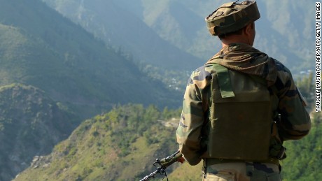 An Indian army soldier looks towards the site of a gunbattle between Indian army soldiers and rebels inside an army brigade headquarters near the border with Pakistan, known as the Line of Control (LoC), in Uri on September 18, 2016.
Militants armed with guns and grenades killed 17 soldiers in a raid September 18 on an army base in Indian-administered Kashmir, the worst such attack for more than a decade in the disputed Himalayan region. / AFP / TAUSEEF MUSTAFA        (Photo credit should read TAUSEEF MUSTAFA/AFP/Getty Images)
