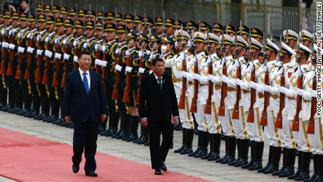 President of the Philippines Rodrigo Duterte and Chinese President Xi Jinping review the honor guard as they attend a welcoming ceremony at the Great Hall of the People on October 20, 2016 in Beijing, China.