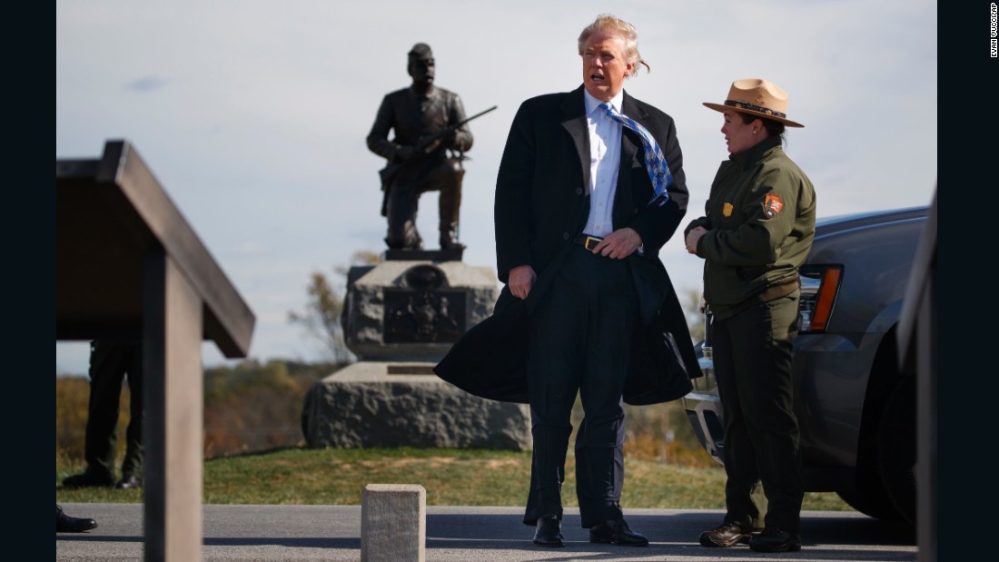Interpretive park ranger Caitlin Kostic, right, gives a tour near the high-water mark of the Confederacy at Gettysburg National Military Park to Republican presidential nominee Donald Trump, Saturday, October 22.