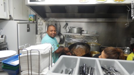 Chef Fabian prepares a dish at the Seven Sisters market in North London. 