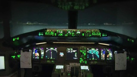 Report: MH370 spiraled into sea 