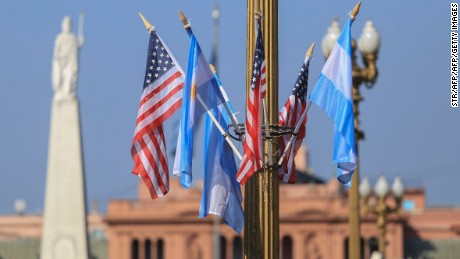 Photo released by Noticias Argentinas of Argentine and US flags adorning Mayo square in Buenos Aires on March 22, 2016. Deadly bomb blasts in Brussels prompted Argentina to raise its security alert level Tuesday as it prepared for a visit by US President Barack Obama. AFP PHOTO / NA / MARCELO CAPECE / AFP / NA / STR        (Photo credit should read STR/AFP/Getty Images)