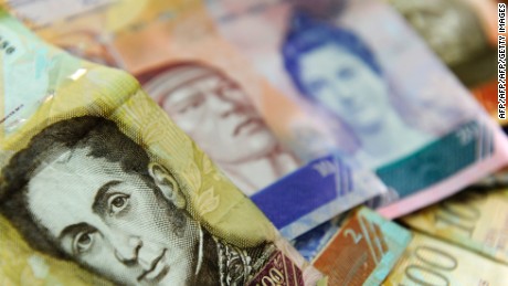 Venezuelan currency is seen in this November 30, 2011 image taken in Caracas, Venezuela. AFP PHOTO/ Leo RAMIREZ (Photo credit should read LEO RAMIREZ/AFP/Getty Images)