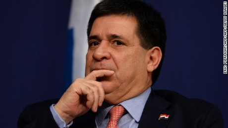 Paraguay's President Horacio Cartes listens prior to address the international economic forum Latin America and the Caribbean at the economy ministry in Paris on June 3, 2016 / AFP / ERIC PIERMONT        (Photo credit should read ERIC PIERMONT/AFP/Getty Images)