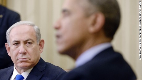 Benjamin Netanyahu, Israel's prime minister, left, looks on as U.S. President Barack Obama, speaks during a meeting in the Oval Office of the White House in Washington, D.C., U.S., on Monday, Nov. 9, 2015. Benjamin Netanyahu is looking past his fraught relationship with President Barack Obama to a more lasting concern as he visits Washington next week: rebuilding IsraelÕs standing with American Democrats. Photographer: Olivier Douliery/Pool via Bloomberg 