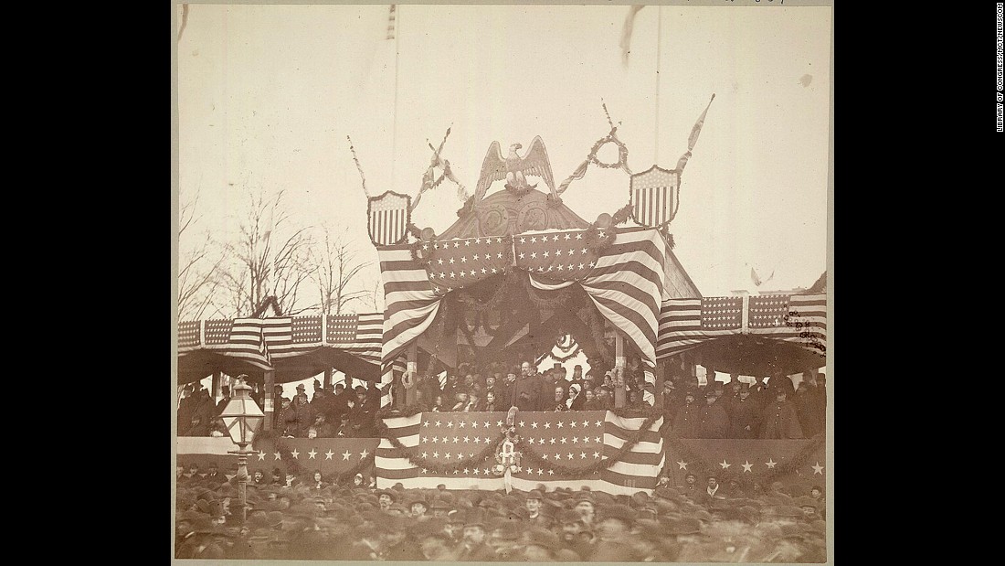 President James A. Garfield views the inauguration ceremonies in 1881. He was the first to watch the parade from a stand built in front of White House.