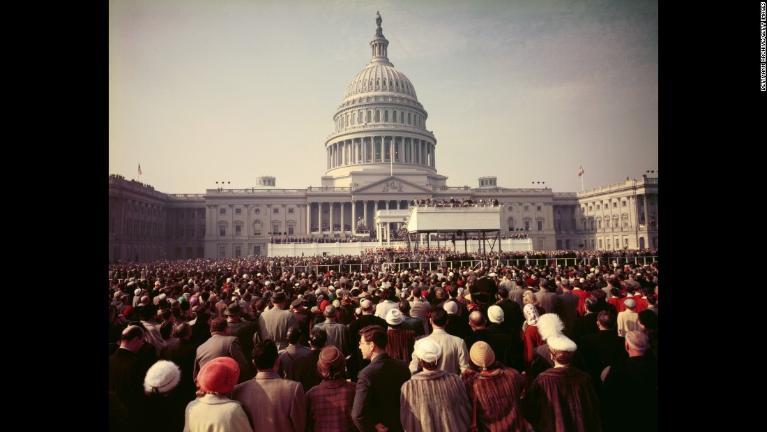 A crowd watches the inauguration ceremony of Dwight D. Eisenhower in 1953. Eisenhower, who served two terms, recited his own prayer after taking the oath of office.