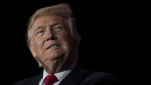 Trump downplays Russian meddling in election despite intel report