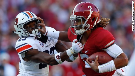 Alabama QB Jalen Hurts, #2, in red. 