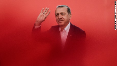 Erdogan greets supporters in August 2016 in Istanbul during a rally against the failed coup.