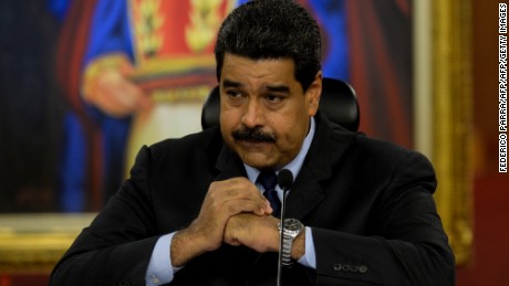 Venezuelan President Nicolas Maduro gestures during a press conference with international media correspondents at the Miraflores Presidential Palace in Caracas on January 18, 2017. 
Venezuelan President Nicolas Maduro on Monday denounced a "hate campaign" aimed at Donald Trump, saying the US president-elect's administration would not be "worse" than Barack Obama's. The socialist president said he will wait until Trump takes over the White House on Friday before making judgments on the incoming US president's foreign policy. / AFP / Federico PARRA        (Photo credit should read FEDERICO PARRA/AFP/Getty Images)