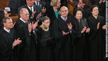 WASHINGTON, DC - FEBRUARY 12: Members of the Supreme Court, (L-R) Chief Justice John Roberts and associate justices Anthony Kennendy, Ruth Bader Ginsburg, John Paul Stevens, Sonia Sotomayor and Elena Kagan, applaud as U.S. President Barack Obama arrives to deliver his State of the Union speech before a joint session of Congress at the U.S. Capitol February 12, 2013 in Washington, DC. Facing a divided Congress, Obama focused his speech on new initiatives designed to stimulate the U.S. economy and said, &#39;It?s not a bigger government we need, but a smarter government that sets priorities and invests in broad-based growth&#39;. (Photo by Chip Somodevilla/Getty Images)