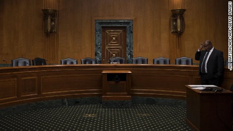 Empty seats in the Senate Finance Committee hearing room on Capitol Hill in Washington, DC, January 31, 2017, after Senate democrats boycotted the markup hearings for the nominations of Steven T. Mnuchin, of California, to be Secretary of the Treasury, and Thomas Price, of Georgia, to be Secretary of Health and Human Services. / AFP / JIM WATSON        (Photo credit should read JIM WATSON/AFP/Getty Images)