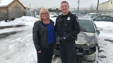 Spokane Police Officer Tim Schwering freed Kim Novak from her burning car in January.