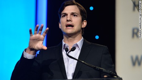 BEVERLY HILLS, CA - NOVEMBER 12:  Actor Ashton Kutcher speaks at the Human Rights Watch Voices For Justice Dinner at The Beverly Hilton Hotel on November 12, 2013 in Beverly Hills, California.  (Photo by Frazer Harrison/Getty Images)