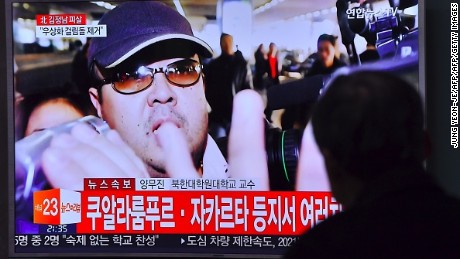 A man watches a television showing news reports of Kim Jong-Nam, the half-brother of North Korean leader Kim Jong-Un, in Seoul on February 14, 2017.