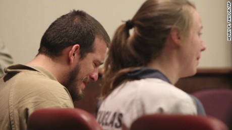 Jose Torres, left, and Kayla Norton, right   at the Douglas County Courthouse in Douglasville, Georgia, Monday, February 27.