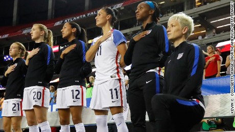 Megan Rapinoe # 15 kneels in the national anthem before the match between the United States and the Netherlands in September 2016.