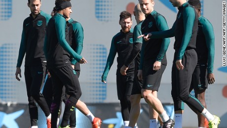 (L to R) Barcelona's midfielder Sergio Busquets, Barcelona's Brazilian forward Neymar, Barcelona's Argentinian forward Lionel Messi, Barcelona's Croatian midfielder Ivan Rakitic and Barcelona's defender Gerard Pique take part in a training session at the Sports Center FC Barcelona Joan Gamper in Sant Joan Despi, near Barcelona on March 7, 2017, on the eve of the UEFA Champions League football match between FC Barcelona and Paris Saint-Germain. / AFP PHOTO / LLUIS GENE        (Photo credit should read LLUIS GENE/AFP/Getty Images)