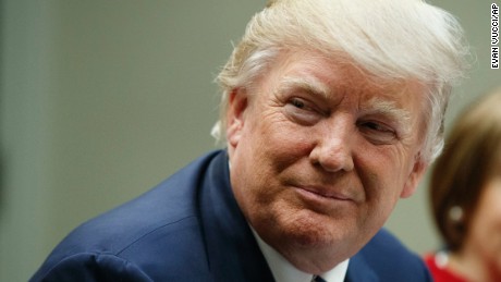President Donald Trump listens during a meeting with leaders from small community banks, Thursday, March 9, 2017, in the Roosevelt Room of the White House in Washington. (AP Photo/Evan Vucci)