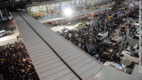 NEW YORK, NY - JANUARY 28: Protestors rally during a demonstration against the new immigration ban issued by President Donald Trump at John F. Kennedy International Airport on January 28, 2017 in New York City. President Trump signed the controversial executive order that halted refugees and residents from predominantly Muslim countries from entering the United States. (Photo by Stephanie Keith/Getty Images)