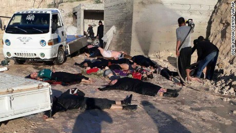 This photo provided Tuesday, April 4, 2017 by the Syrian anti-government activist group Edlib Media Center, which has been authenticated based on its contents and other AP reporting, shows  victims of a suspected chemical attack, in the town of Khan Sheikhoun, northern Idlib province, Syria. The suspected chemical attack killed dozens of people on Tuesday, Syrian opposition activists said, describing the attack as among the worst in the country's six-year civil war. (Edlib Media Center, via AP)