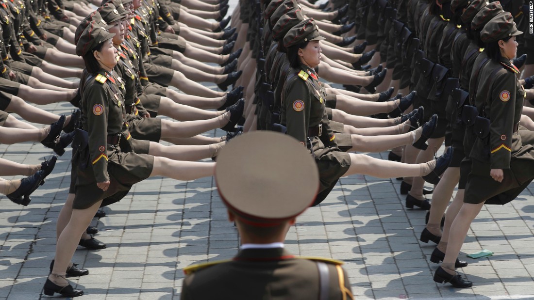 Female North Korean soldiers march during the parade.