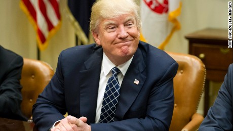 US President Donald Trump makes remarks as he hosts a listening session with the Fraternal Order of Police in the Roosevelt Room of the  White House on March 28, 2017  in Washington, DC. 