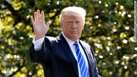 US President Donald Trump waves as he walks towards Marine One while departing the White House on May 17, 2017 in Washington, DC en route to Connecticut. / AFP PHOTO / Olivier Douliery        (Photo credit should read OLIVIER DOULIERY/AFP/Getty Images)