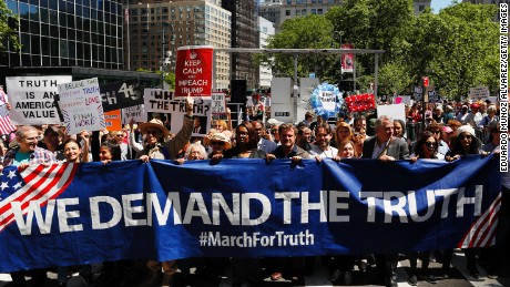 Demonstrators march as they take part in an anti-Trump &quot;March for Truth&quot; rally on June 3, 2017 in New York City. 