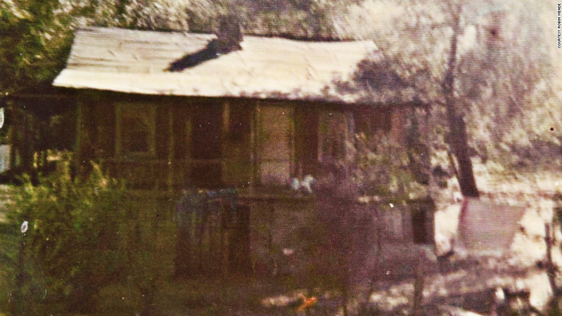 This is the house where Linro Meade was born, built by hand by his father on rented land using no modern machinery. The chimney was made from rocks and clay mortar and the lumber is rough sawn. It was never painted and had no running water or heat, with the exception of a small fireplace. 