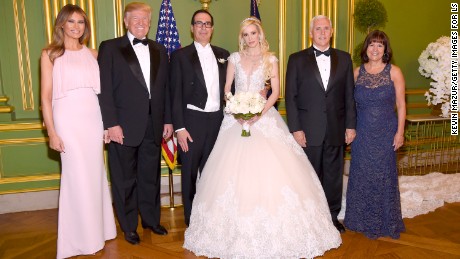 WASHINGTON, DC - JUNE 24: (Exclusive Coverage) (L-R) First Lady Melania Trump, President Donald Trump, Secretary of the Treasury Steven Mnuchin, Louise Linton, Vice President Mike Pence, and Second Lady Karen Pence pose at the wedding of Secretary of the Treasury Steven Mnuchin and Louise Linton on June 24, 2017 at Andrew Mellon Auditorium in Washington, DC. Louise Linton is wearing a custom Ines DiSanto gown with wedding ring and earrings by Martin Katz.  (Photo by Kevin Mazur/Getty Images for LS)