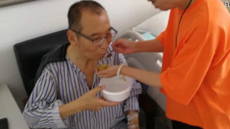 In this recent undated handout photo, Chinese dissident and Nobel Prize laureate Liu Xiaobo, left, is attended to by his wife Liu Xia in a hospital in China. Liu Xiaobo has been released from prison on medical parole after being diagnosed earlier June 2017 with late-stage liver cancer and is being treated in a hospital in the northeastern city of Shenyang. He had been more than half-way through an 11-year sentence after being convicted in 2009 on subversion charges. (Photo via AP)