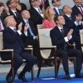 (FromL) US First Lady Melania Trump, US President Donald Trump, French President Emmanuel Macron and his wife Brigitte Macron attend the annual Bastille Day military parade on the Champs-Elysees avenue in Paris on July 14, 2017.
Bastille Day, the French National Day, is held annually each July 14, to commemorate the storming of the Bastille fortress in 1789. This years parade on Paris&#39;s Champs-Elysees will commemorate the centenary of the US entering WWI and will feature horses, helicopters, planes and troops. / AFP PHOTO / CHRISTOPHE ARCHAMBAULT        (Photo credit should read CHRISTOPHE ARCHAMBAULT/AFP/Getty Images)