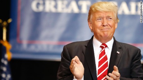 President Donald Trump arrives at a rally at the Phoenix Convention Center, Tuesday, Aug. 22, 2017, in Phoenix. (AP Photo/Alex Brandon)