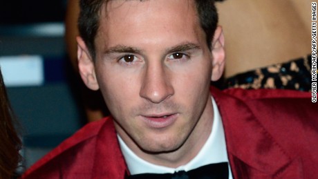 Barcelona's Argentine forward Lionel Messi (R) and his partner Antonella Roccuzzo attend the 2013 FIFA Ballon d'Or award ceremony at the Kongresshaus in Zurich on January 13, 2014. AFP PHOTO / OLIVIER MORIN        (Photo credit should read OLIVIER MORIN/AFP/Getty Images)