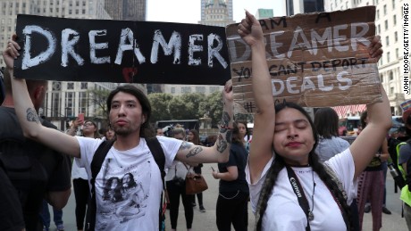 Gloria Mendoza wipes back tears as she protests with Jovan Rodrigo and other &quot;Dreamers&quot; near Trump Tower in New York City on September 5 after the Trump administration announced its decision to end the DACA program.