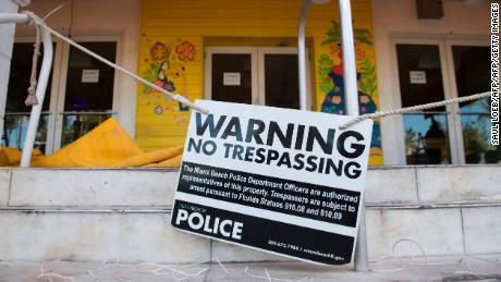A sign warns about trespassing as residents and tourists evacuate Miami Beach, Florida, September 7, 2017, ahead of Hurricane Irma.
Hurricane Irma will have a "truly devastating" impact when it slams into southern coastal areas of the United States, the head of the US emergency agency said.  / AFP PHOTO / SAUL LOEB        (Photo credit should read SAUL LOEB/AFP/Getty Images)