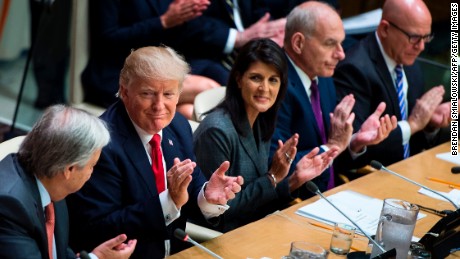 US President Donald Trump (2L), US Ambassador to the UN Nikki Haley (C), White House Chief of Staff John Kelly (2R) and National Security Advisor H. R. McMaster (R) clap for UN Secretary-General Antonio Guterres (L) a meeting on United Nations Reform at the UN headquarters in New York on September 18, 2017. (BRENDAN SMIALOWSKI/AFP/Getty Images)