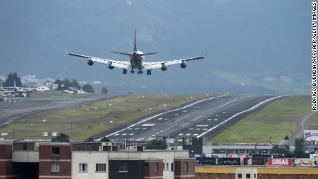 A cargo plane lands at the Mariscal Sucre international airport in Quito on February 19, 2013. Quito's airport closes its doors for security reasons today at 19H00 local time (00H00 GMT) and the new Mariscal Sucre, built 15 km east from the city centre in Tababela, begins operating on February 20.  AFP PHOTO/RODRIGO BUENDIA        (Photo credit should read RODRIGO BUENDIA/AFP/Getty Images)