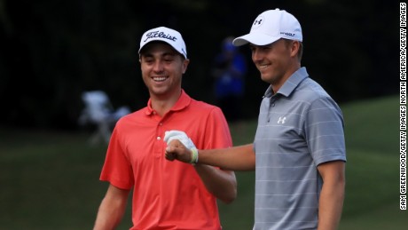 HONOLULU, HI - JANUARY 12:  Justin Thomas of the United States is congratulated by Jordan Spieth of the United States after chipping in on the tenth hole during the first round of the Sony Open In Hawaii at Waialae Country Club on January 12, 2017 in Honolulu, Hawaii.  (Photo by Sam Greenwood/Getty Images)